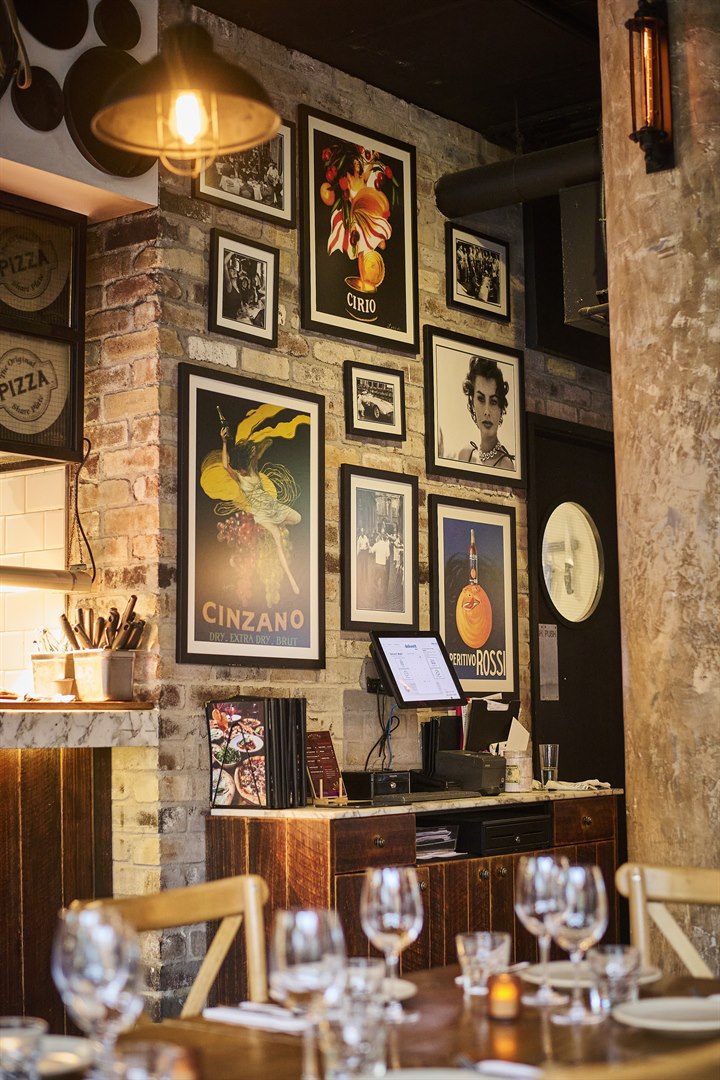 Inside Andiamo Trattoria Chippendale - warm Italian dining room on Kensington Street